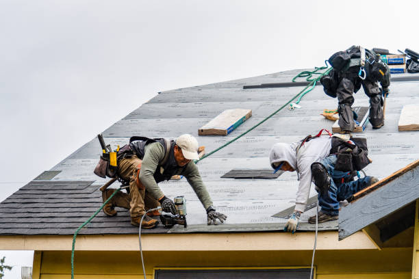 Professional Gutter Installation technician working in Corolla, NC